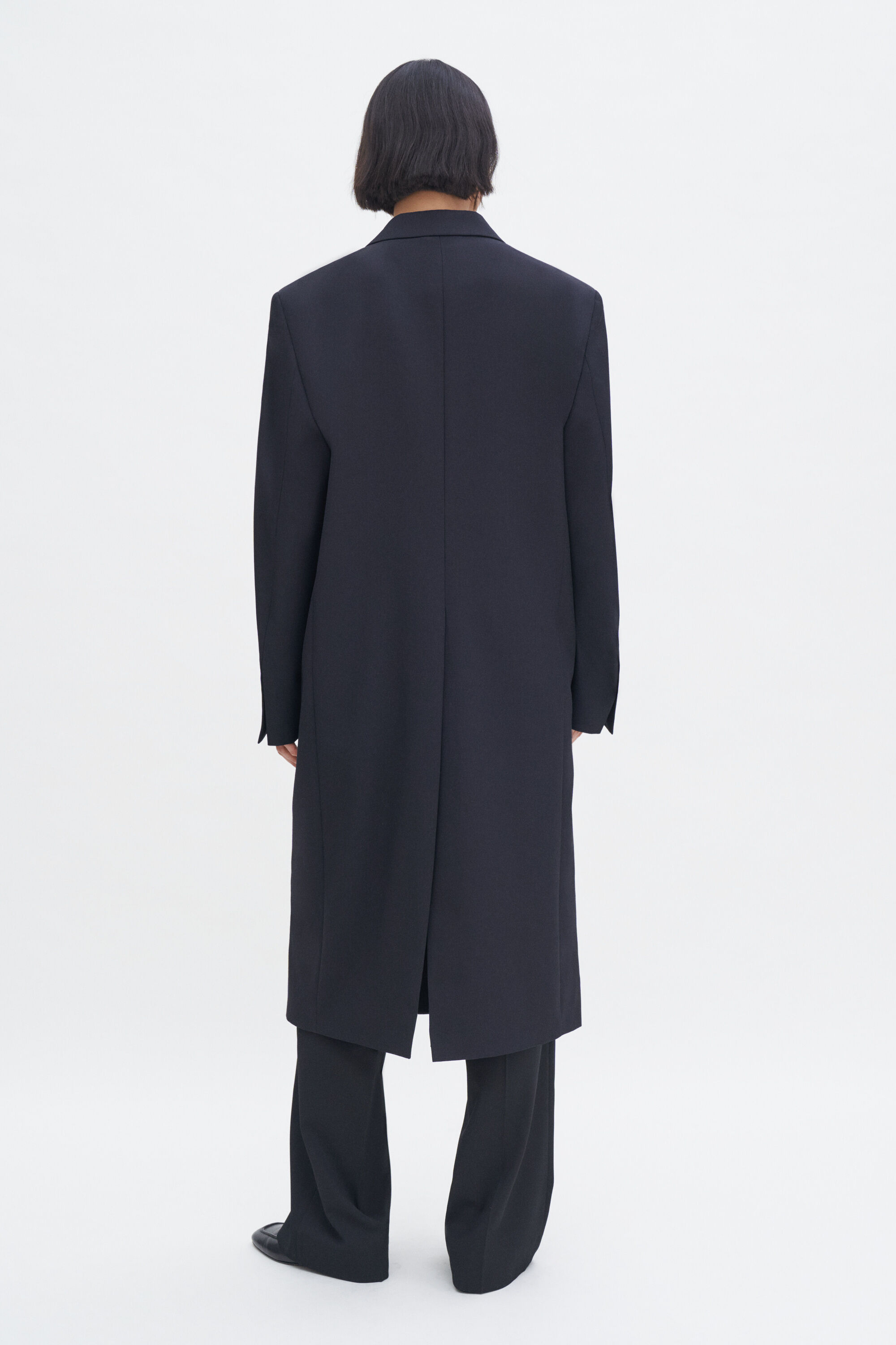 Tailored black coat sales
