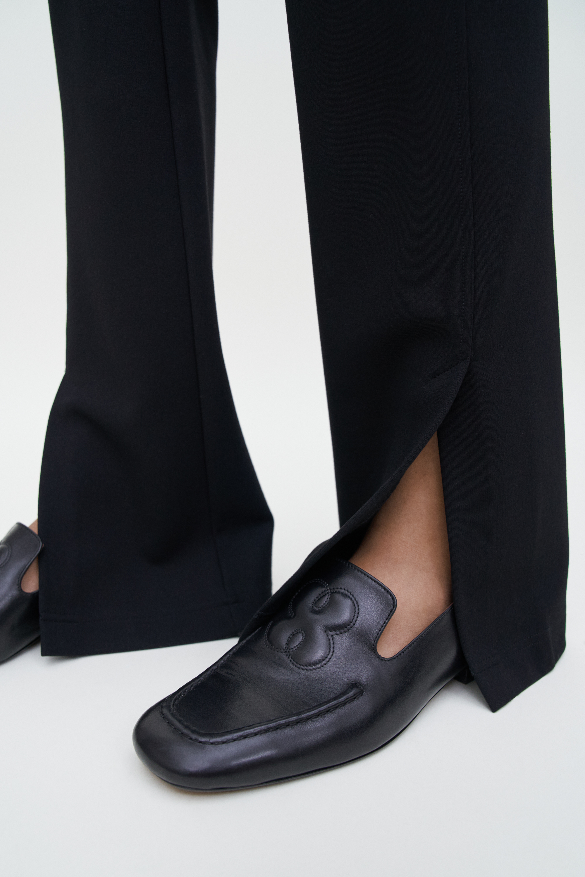 Filippa K Split Hem Jersey Trousers In Black