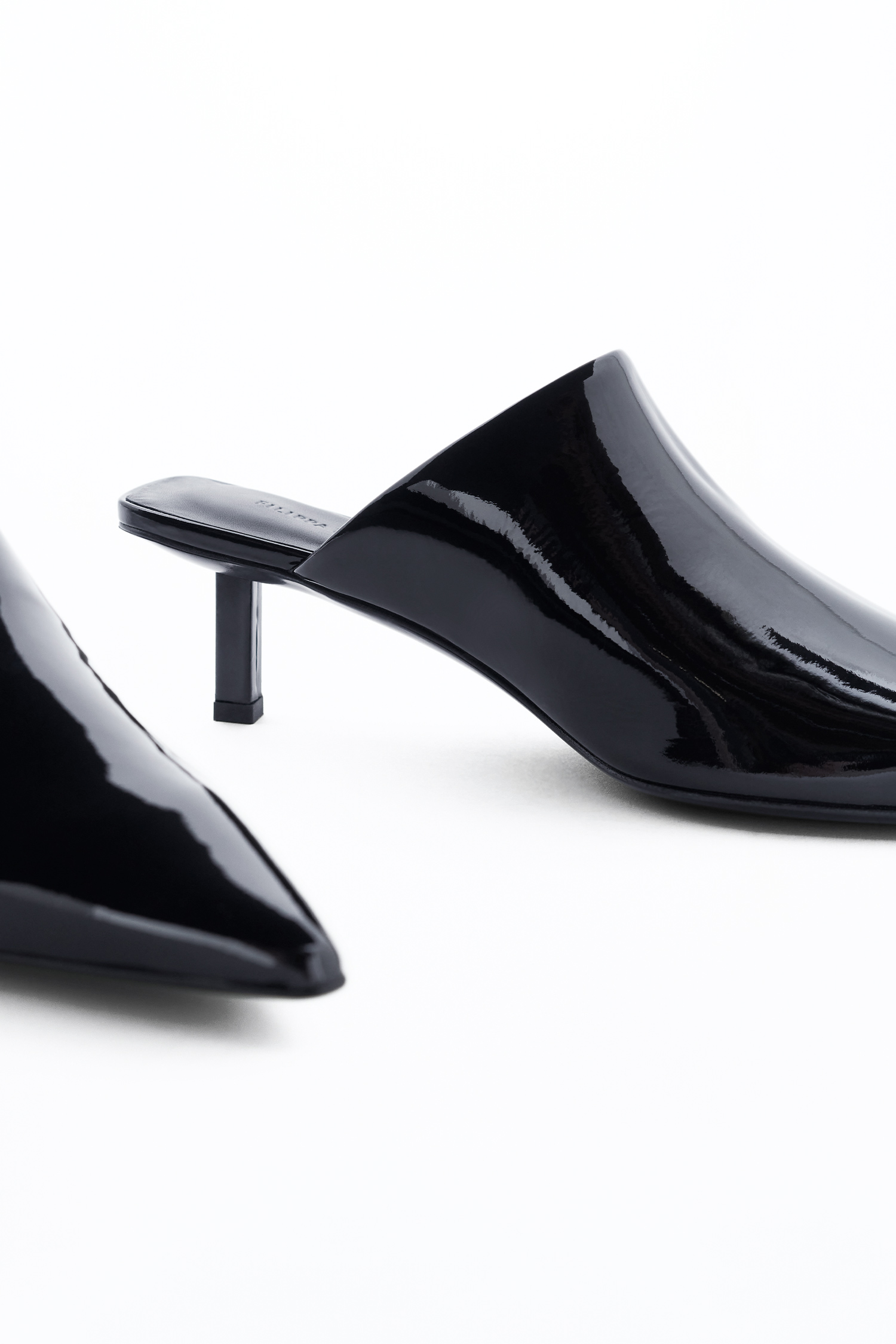 Shop Filippa K Pointy Kitten Heel Mules In Black